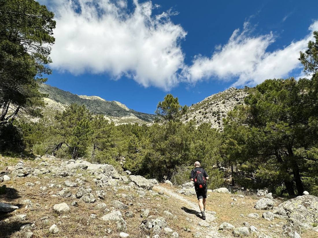 Rob walking ahead of me up a stony trail toward the Gredos ridge